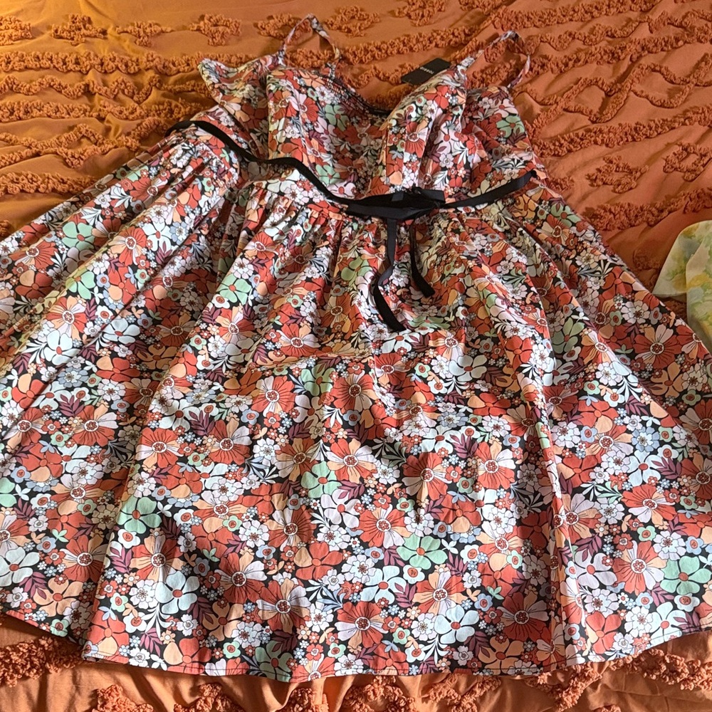 Retro Chic Orange Floral Midi Dress with Black Details